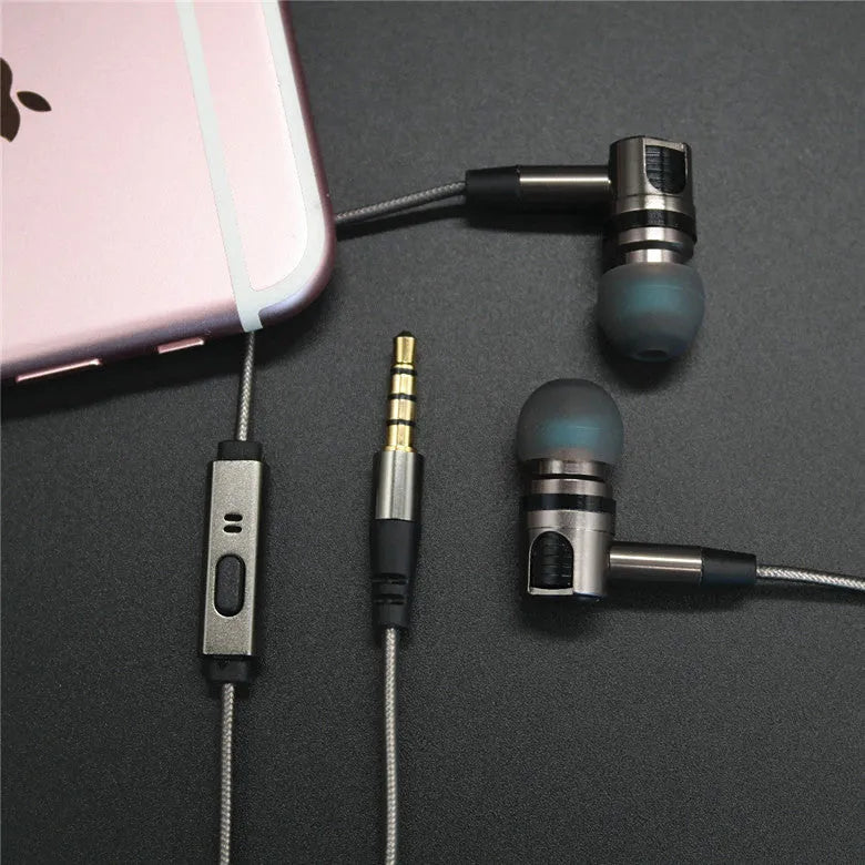 Titanium grey metal in-ear earphones with a braided aluminium foil and TPE cable and detachable connectors.