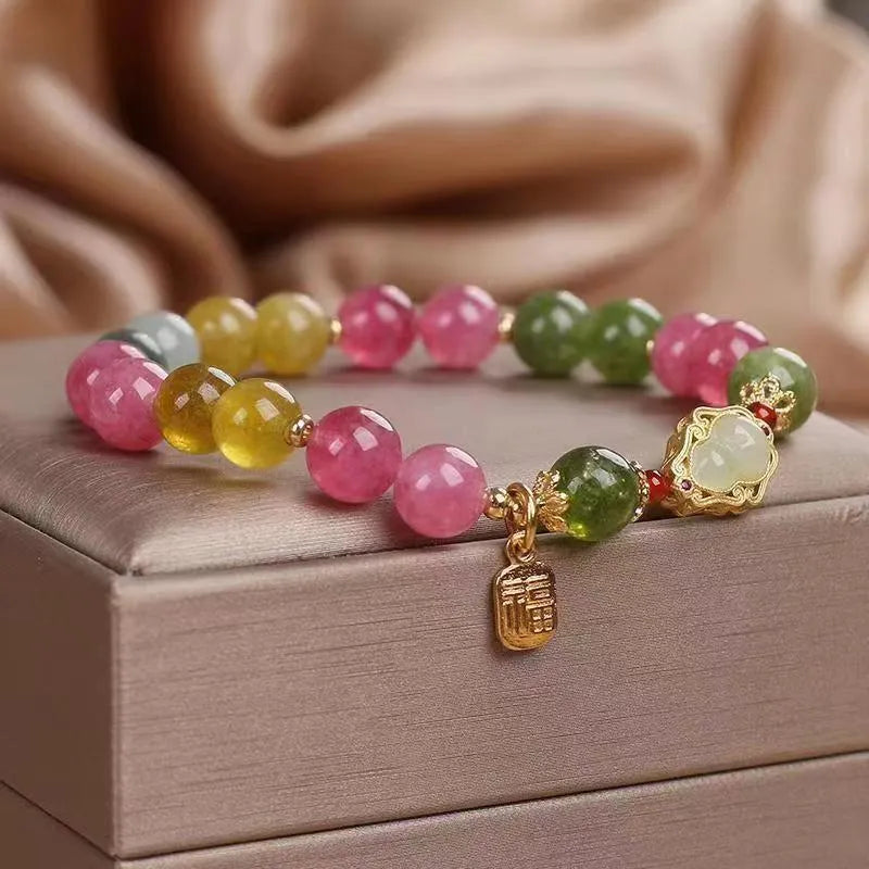 Women's bracelet with colourful tourmaline beads and electroplated gourd blessing card and flower charms