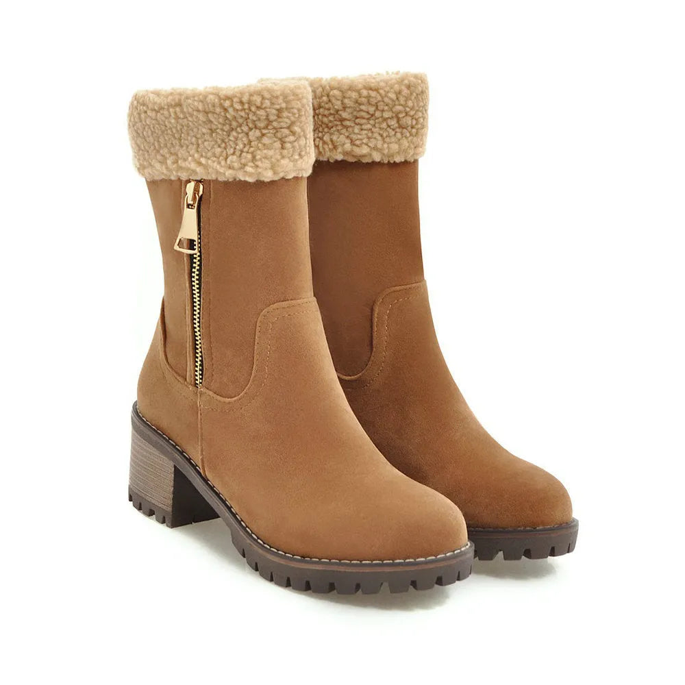 A pair of adult snow boots with plush lining, shown in one of the available colours: black, grey, green, or orange.