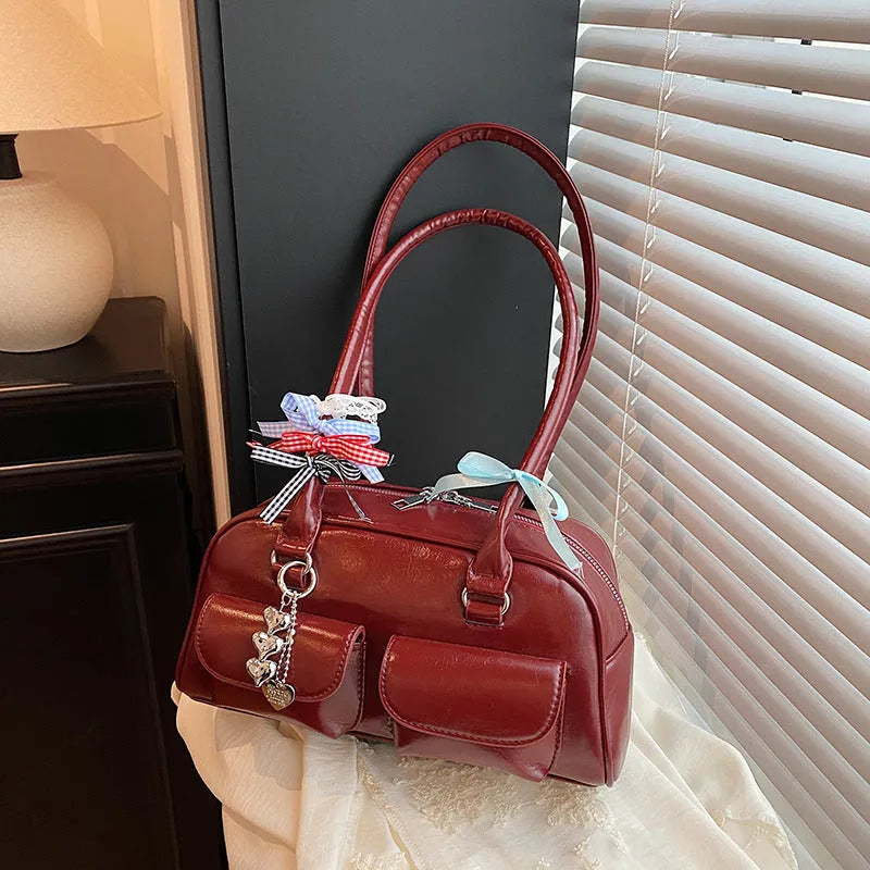 Retro style women's PU leather pillow bag with double shoulder strap in black colour