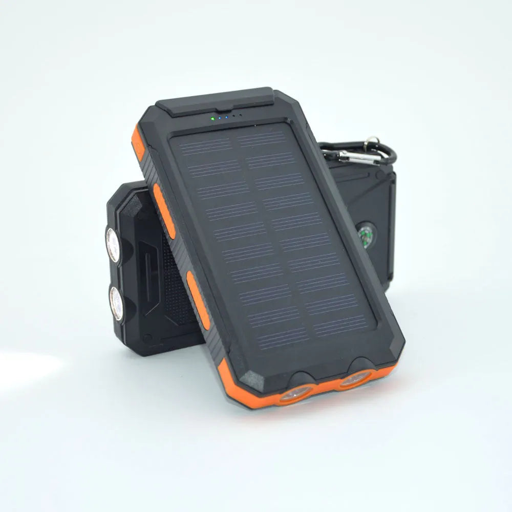 Black solar power bank with LED flashlight showing dimensions and charging ports