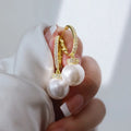 Yellow gold copper earrings with imitation pearl and zircon inlay geometric round ring style