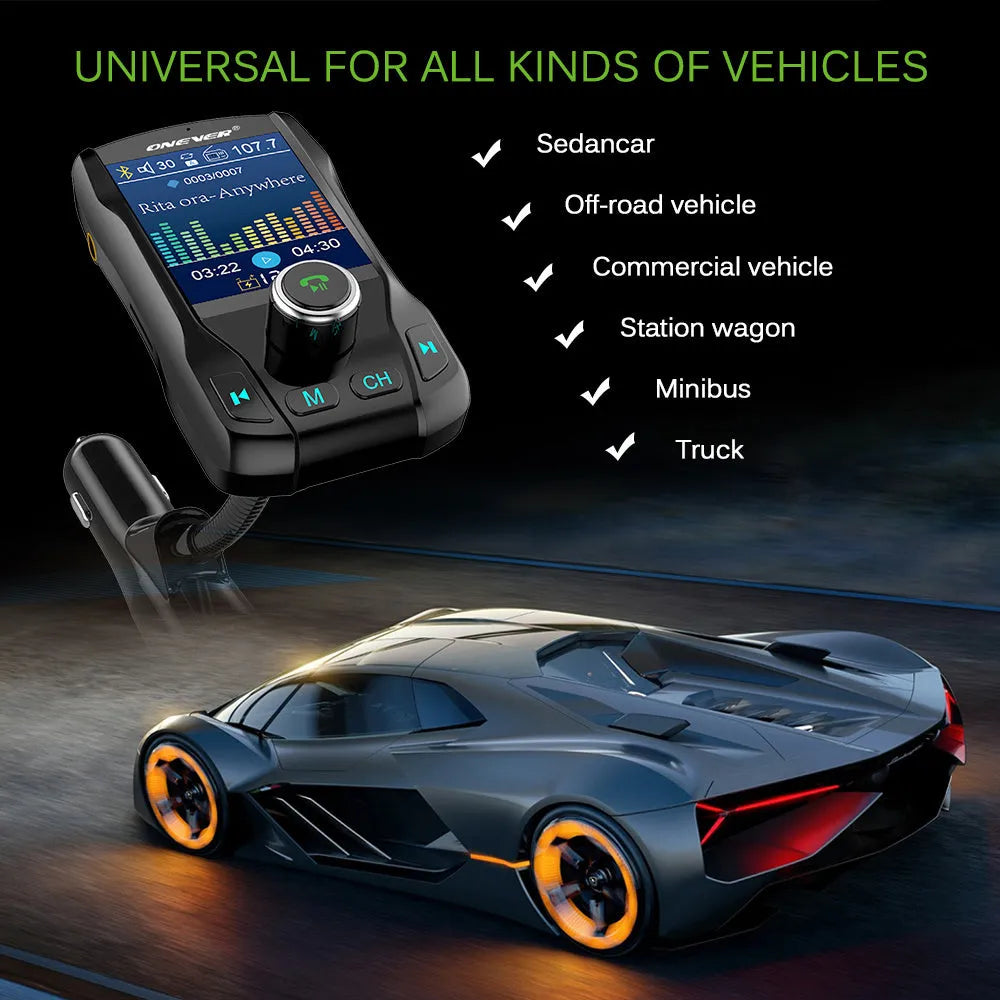 Black car FM transmitter with colour screen and dual USB ports plugged into a car dashboard