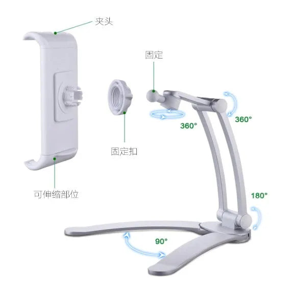 Silver aluminium alloy desktop tablet stand holding a tablet, showing its 360-degree rotation and adjustable chuck mechanism.