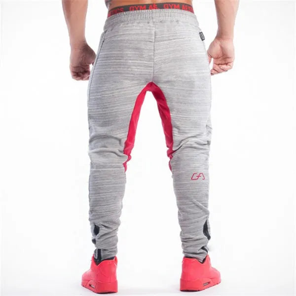 Men's slim-fit cotton sweatpants in grey black with elastic waistband and tapered leg