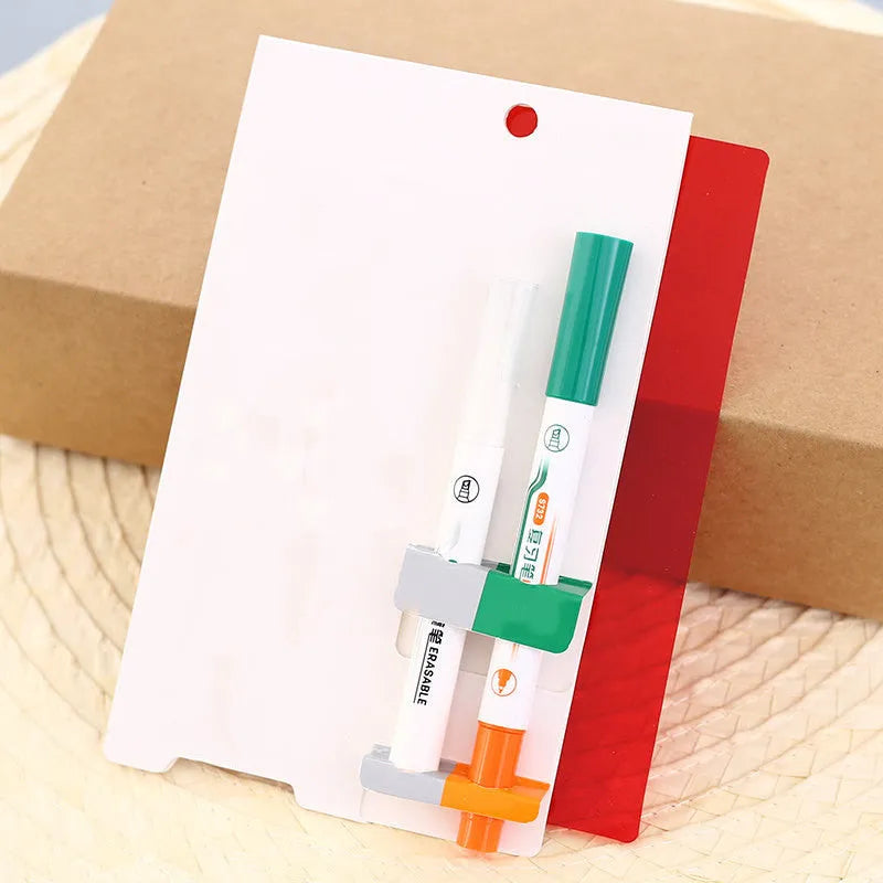 Green erasable highlighter pen set with correction pen and eraser on card packaging