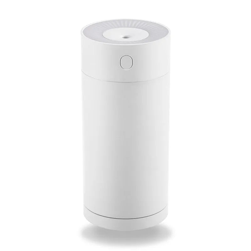 Blue folding bracket USB desktop humidifier with water tank on a wooden desk