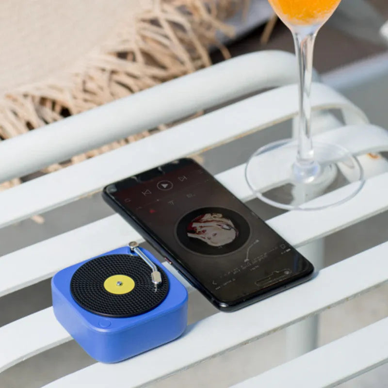 Wireless mini portable record vinyl bluetooth speaker in blue with compact 65x65x62mm size
