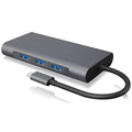 12-in-1 USB C hub in black with Ethernet HDMI VGA and PD ports on a desk