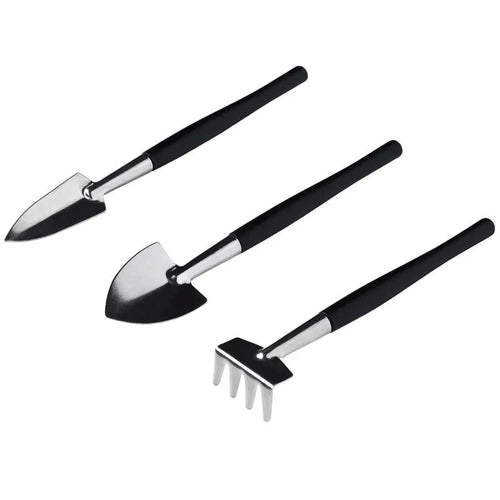 Black plastic and metal mini garden tool set for succulents, with tools laid out on a 75cm square cushion.