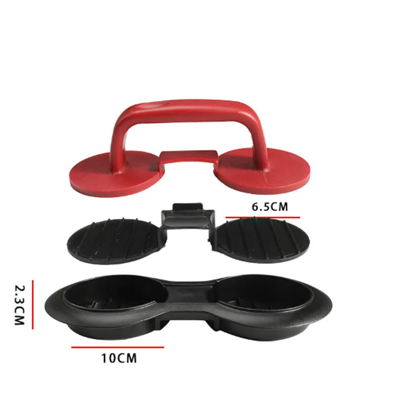 Black food-grade ABS burger press kitchen gadget on a kitchen counter.