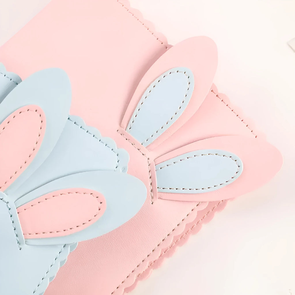 Cute Bunny themed mini photo album in blue, pink, or white for 3-inch prints.