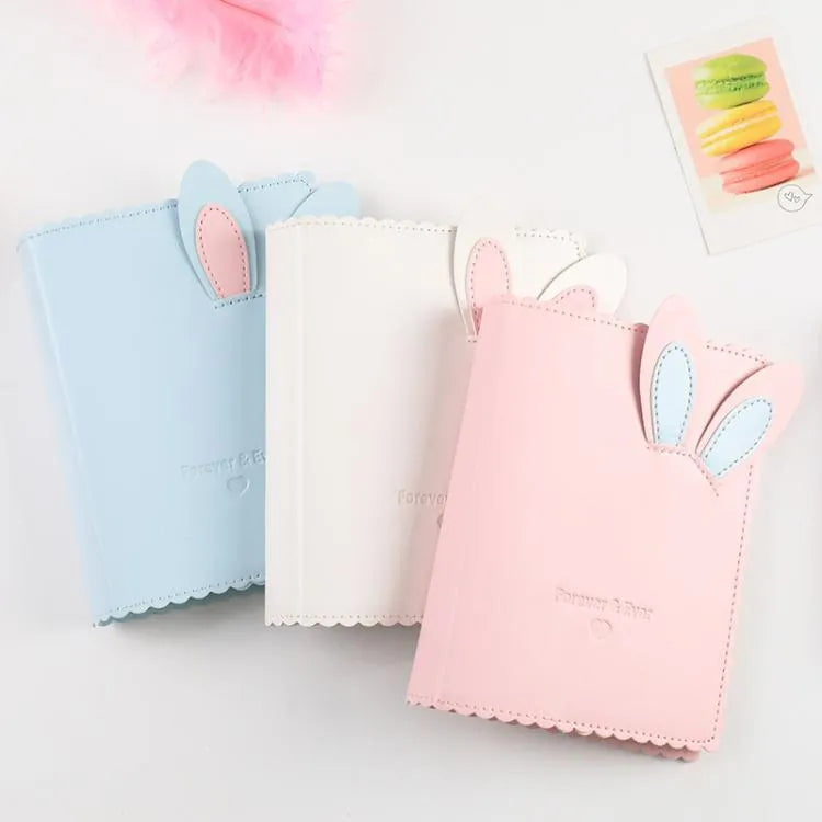 Cute Bunny themed mini photo album in blue, pink, or white for 3-inch prints.
