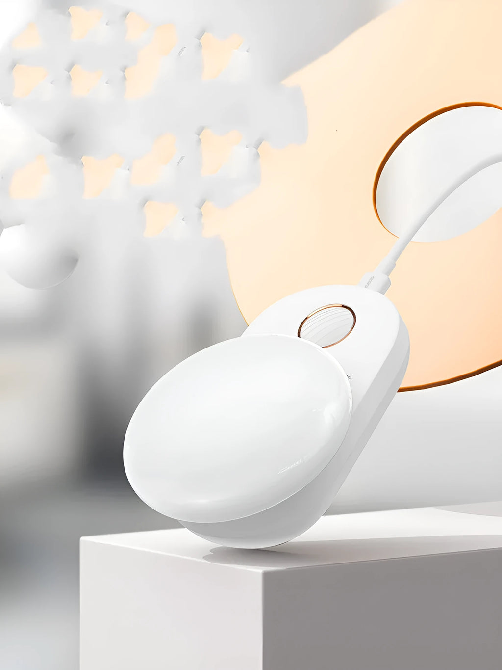 White Baseus rechargeable sensor night light with LED glow, shown on a bedside table.