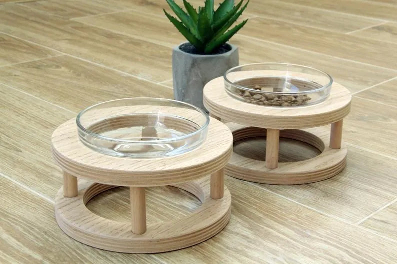 Wooden raised pet bowl stand with glass bowls, available in small, medium and large sizes for cats and small dogs.