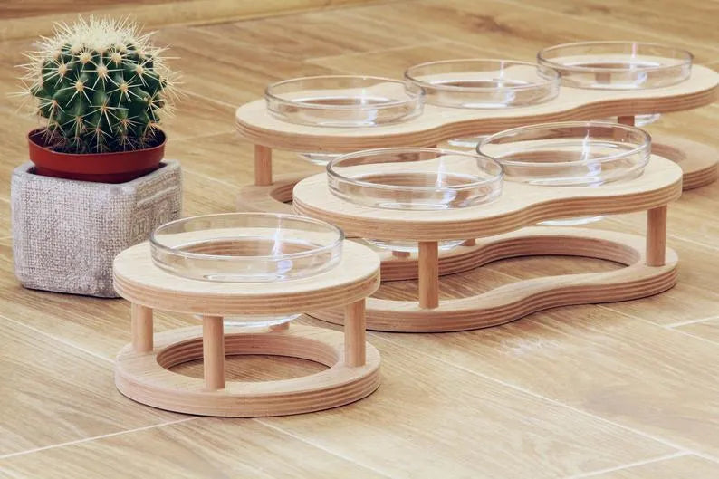 Wooden raised pet bowl stand with glass bowls, available in small, medium and large sizes for cats and small dogs.