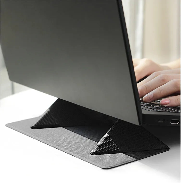Blue foldable laptop cooling stand with non-slip surface shown open and closed, next to a 15-inch notebook.
