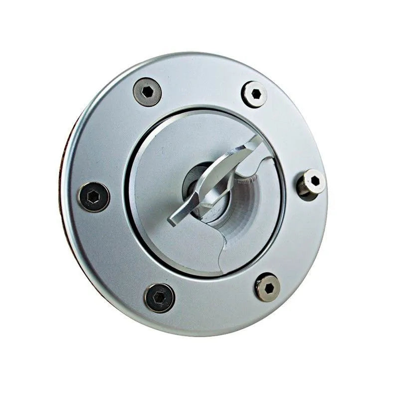 Silver aluminium alloy fuel tank cap designed for universal car fitment.