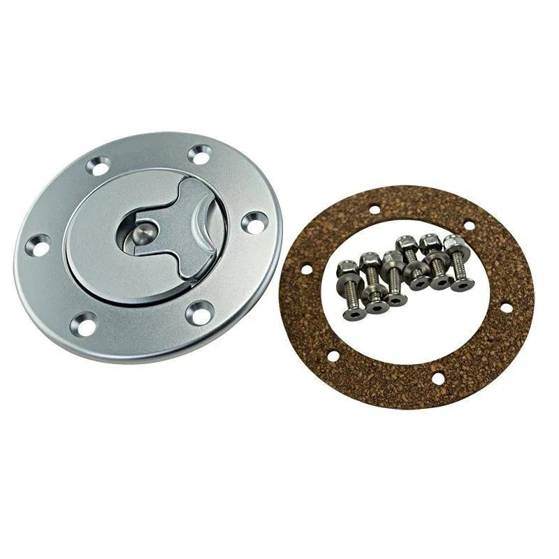 Silver aluminium alloy fuel tank cap designed for universal car fitment.