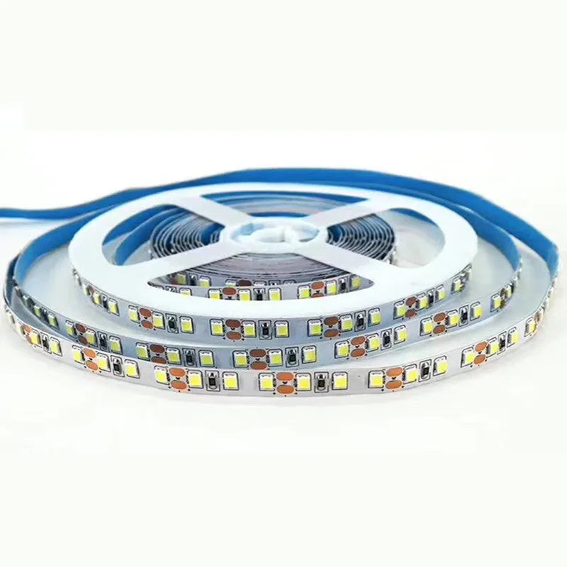 Close-up of a flexible 12V white LED light strip, showing either 2835 or 5050 LEDs, for counter and shelf lighting.
