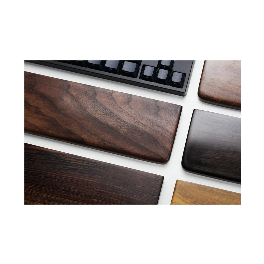 Solid black walnut wood wrist rest for a 60% mechanical keyboard, 30cm long.