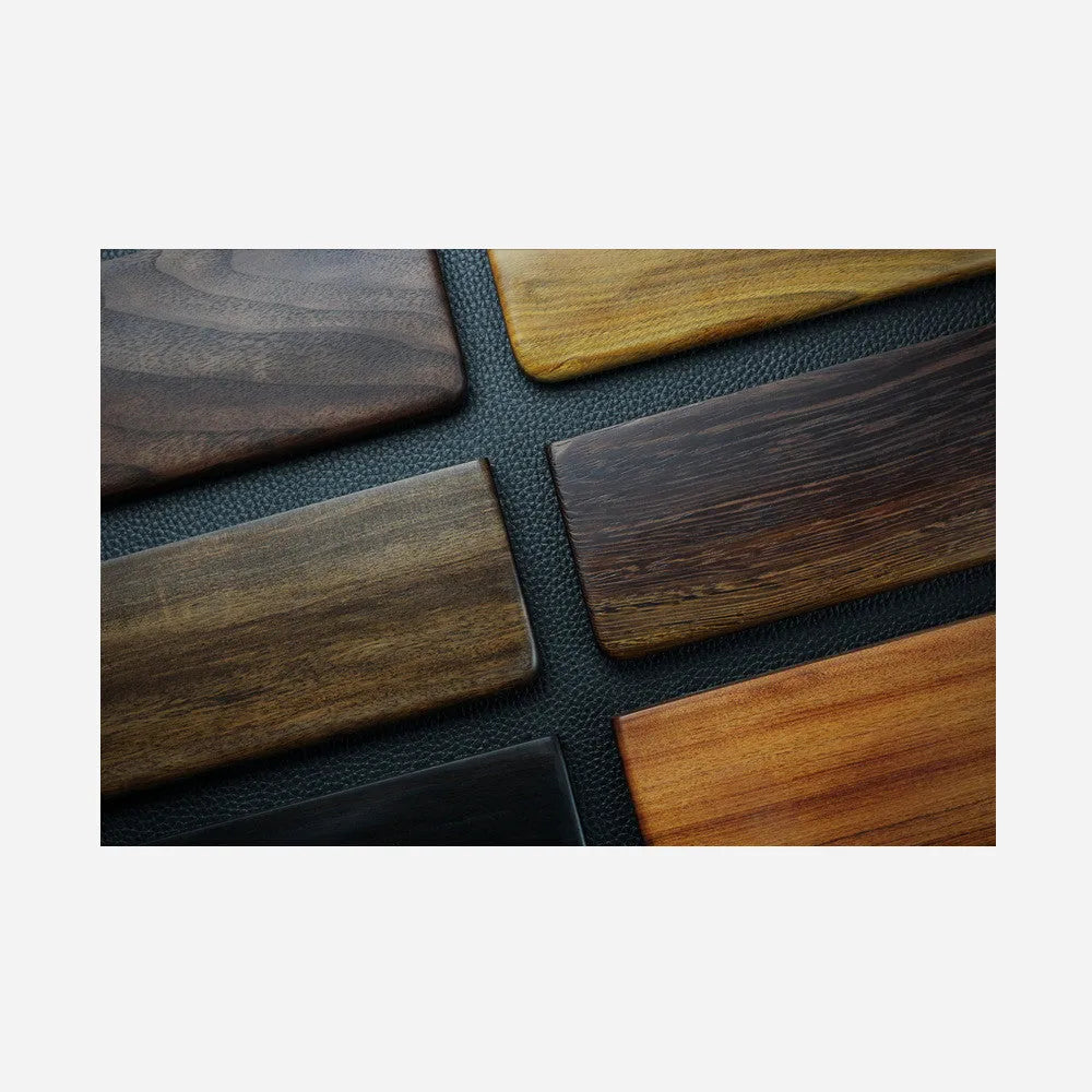 Solid black walnut wood wrist rest for a 60% mechanical keyboard, 30cm long.