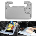 Multifunctional car desk in black ABS, 425 x 285 x 25mm, mounted on car steering wheel with adjustable angle.