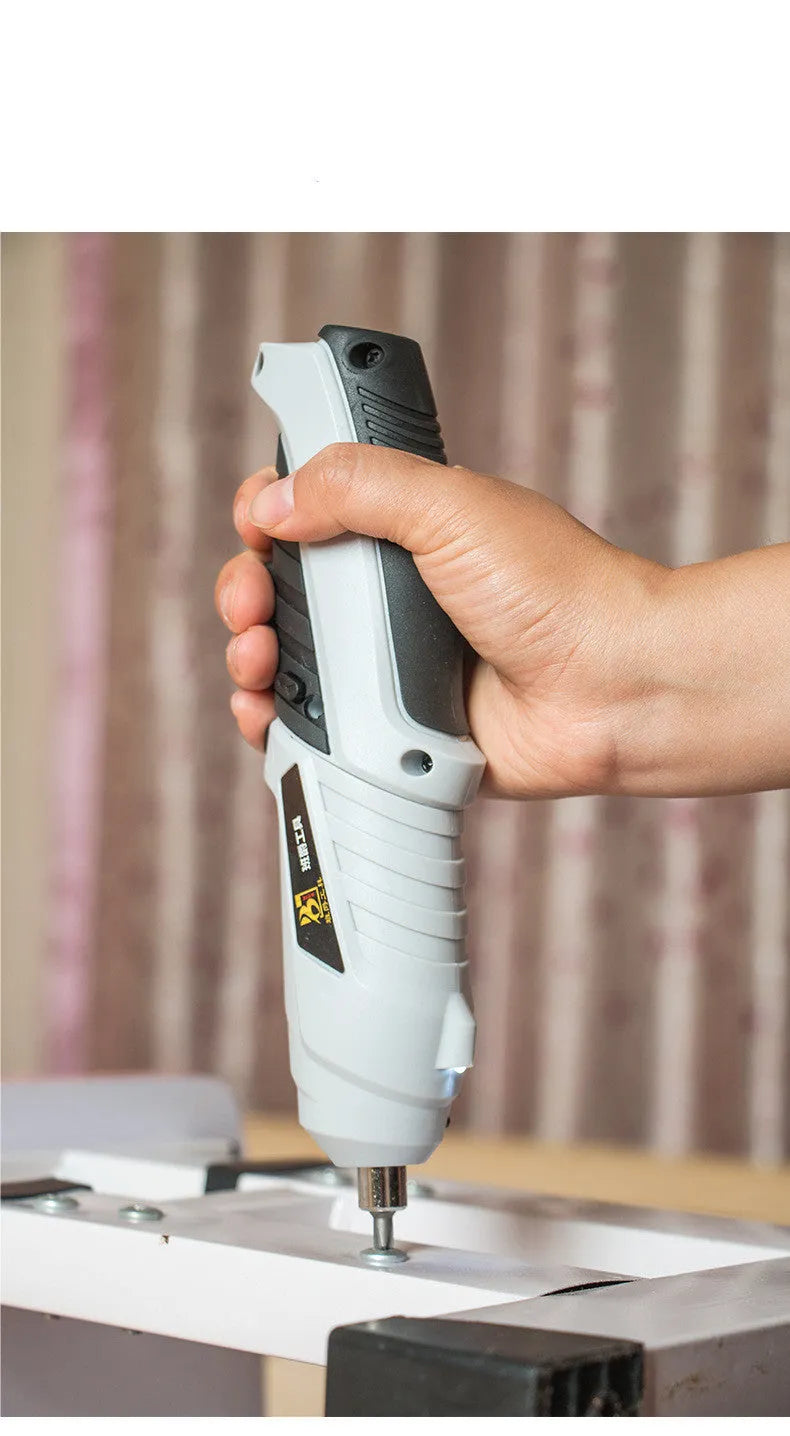 Black and grey rechargeable lithium battery screwdriver with pistol grip, USB cable, and assorted screwdriver bits.
