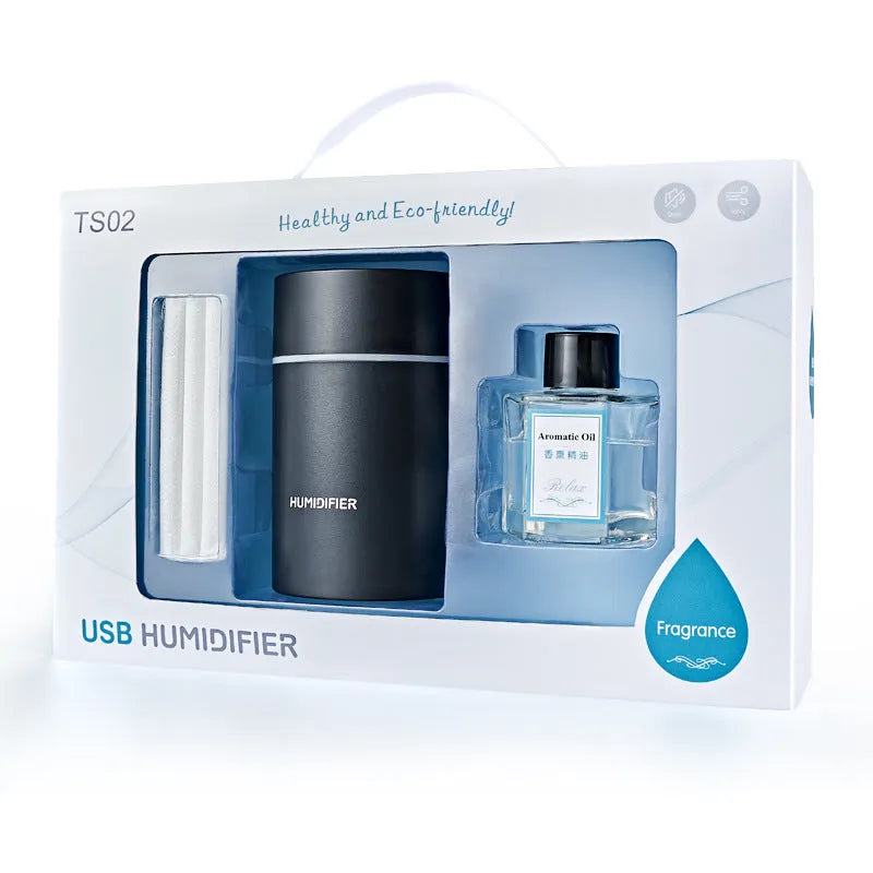 USB Mini Aromatherapy Desktop Atomizer in black, columnar design, single fog outlet, mechanical dial control