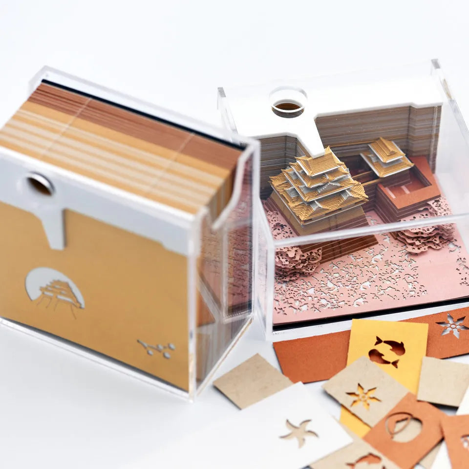 Three-dimensional white specialty paper architectural model of the Tianshou Tower from Spirited Away.