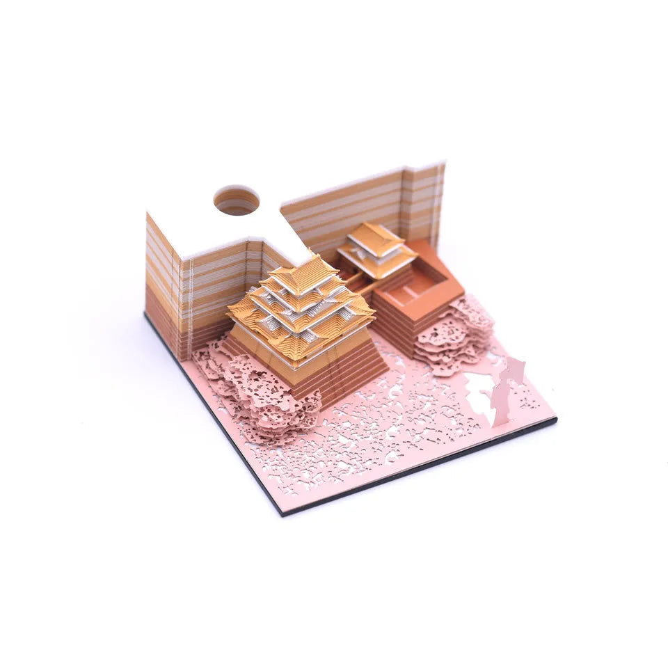 Three-dimensional white specialty paper architectural model of the Tianshou Tower from Spirited Away.