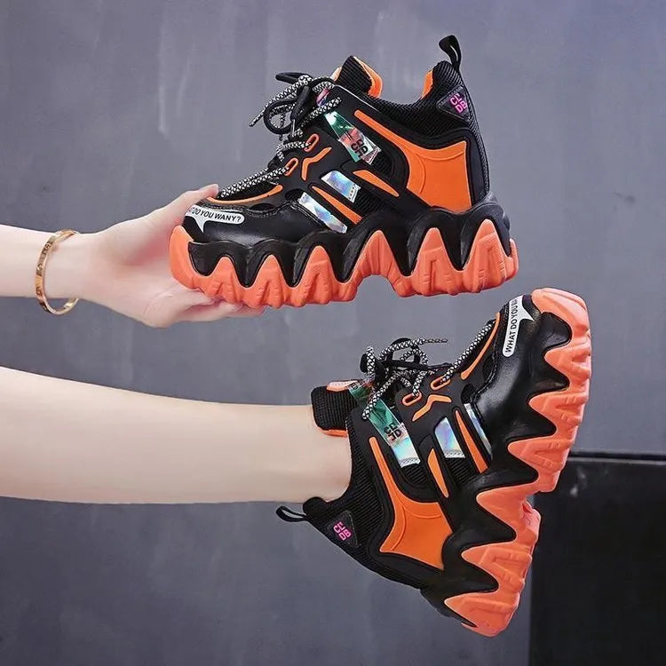 Women's platform casual sports shoes in grey with cross straps and waterproof platform, inner height design