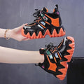 Women's platform casual sports shoes in grey with cross straps and waterproof platform, inner height design