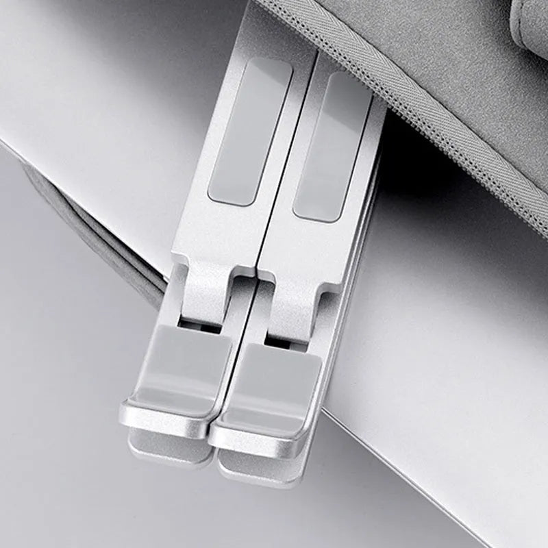 Double-layer aluminium alloy foldable laptop stand in silver, height adjustable from 25 to 310 mm
