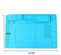 Blue mobile phone computer repair magnetic heat insulation work mat on a desk