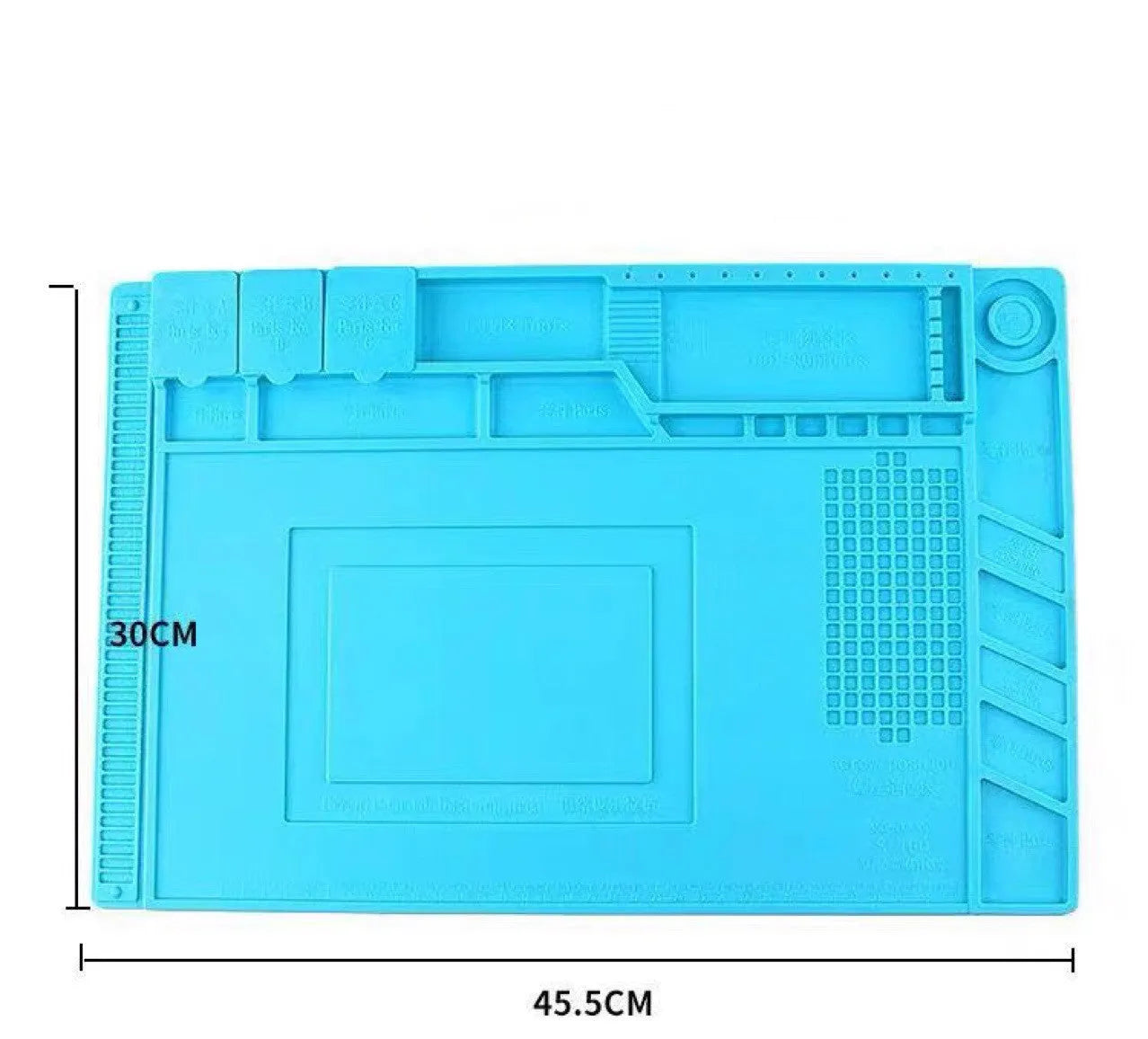 Blue mobile phone computer repair magnetic heat insulation work mat on a desk