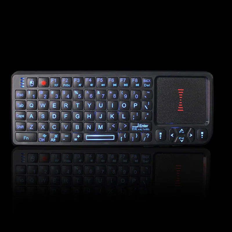 Black wireless mini keyboard with touch screen, showing compact size and USB receiver.