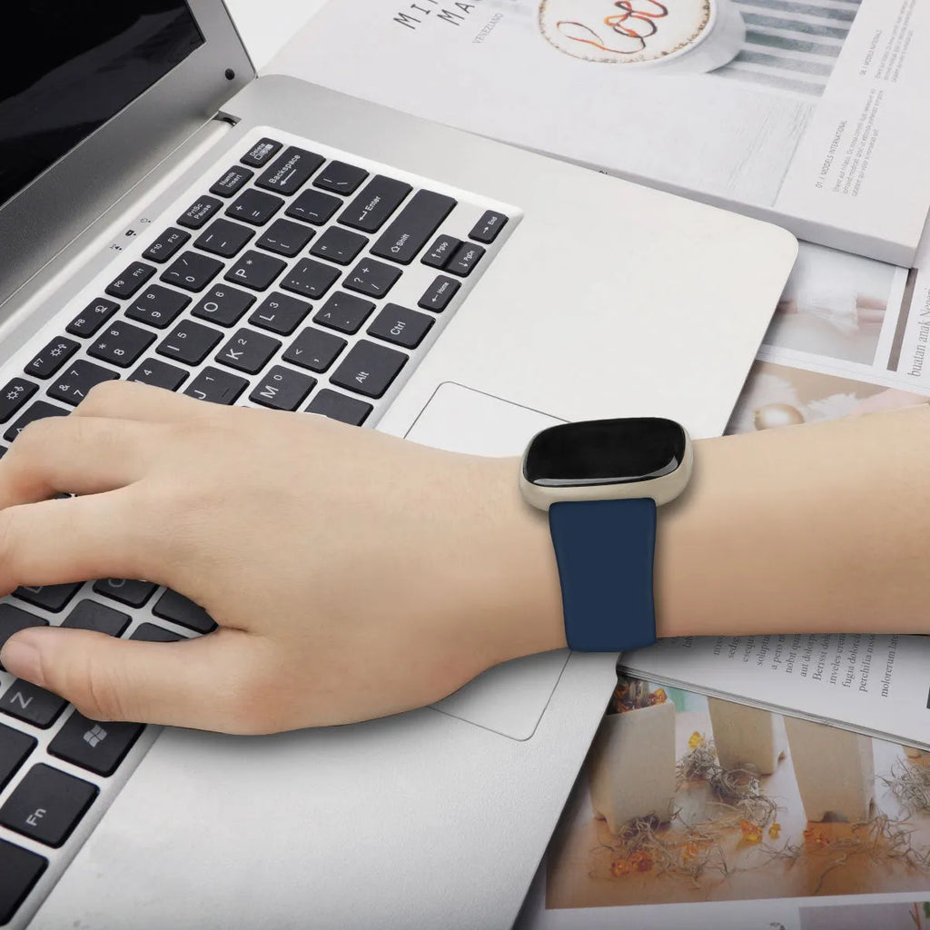 Fitbit Versa3 smartwatch with a TPU silicone replacement strap in one of six available colours