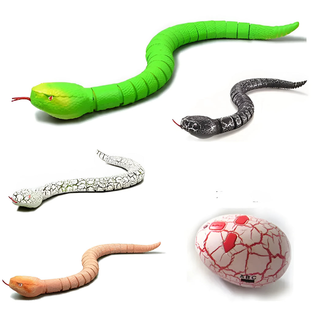 Remote control black cobra snake toy with USB charging cable and batteries on floor