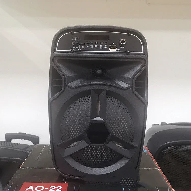 Black portable Bluetooth speaker with card slot and control buttons