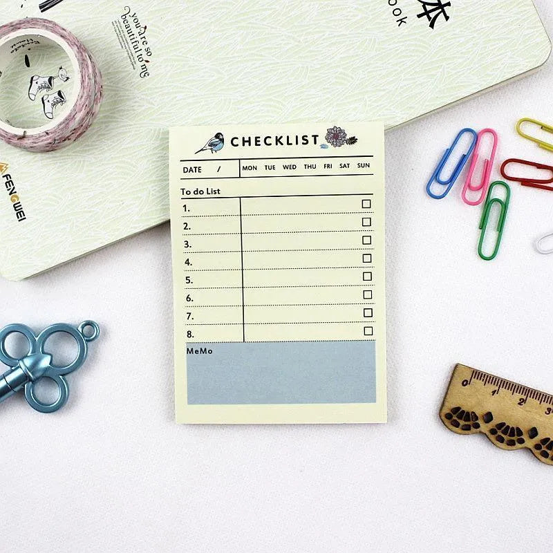 Compact work plan diary notebook showing four different design style options for weekly and monthly planning