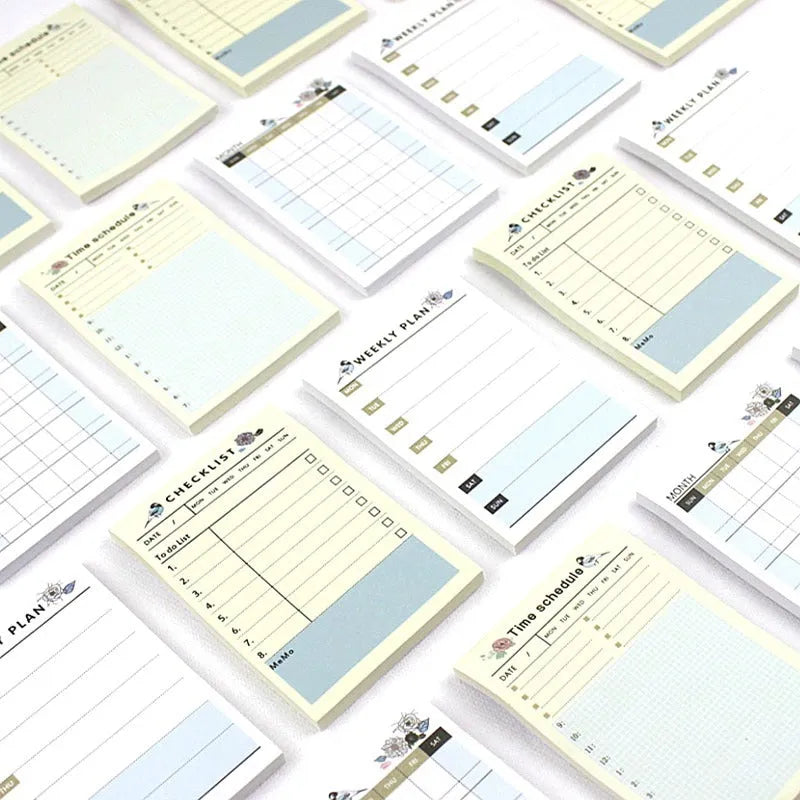 Compact work plan diary notebook showing four different design style options for weekly and monthly planning