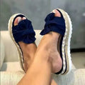 Women's bow platform sandals with artificial PU upper and rubber sole in black