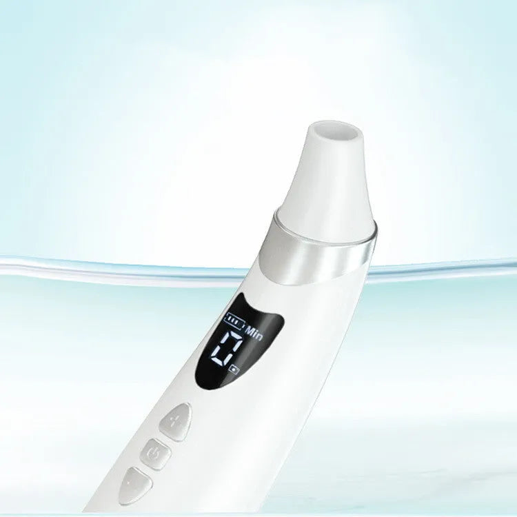 White electric visual blackhead suction instrument with LED display, four silicone heads, and USB charging cable on a sponge bag.