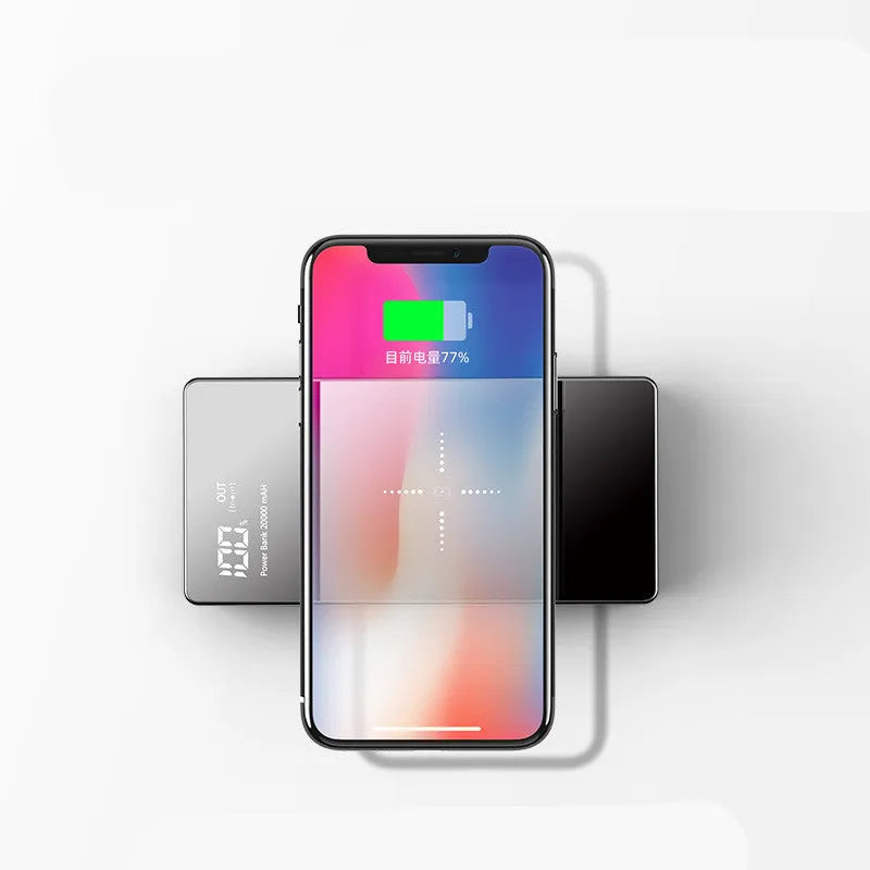Black and white wireless charging power bank with digital display showing 20000 mAh capacity