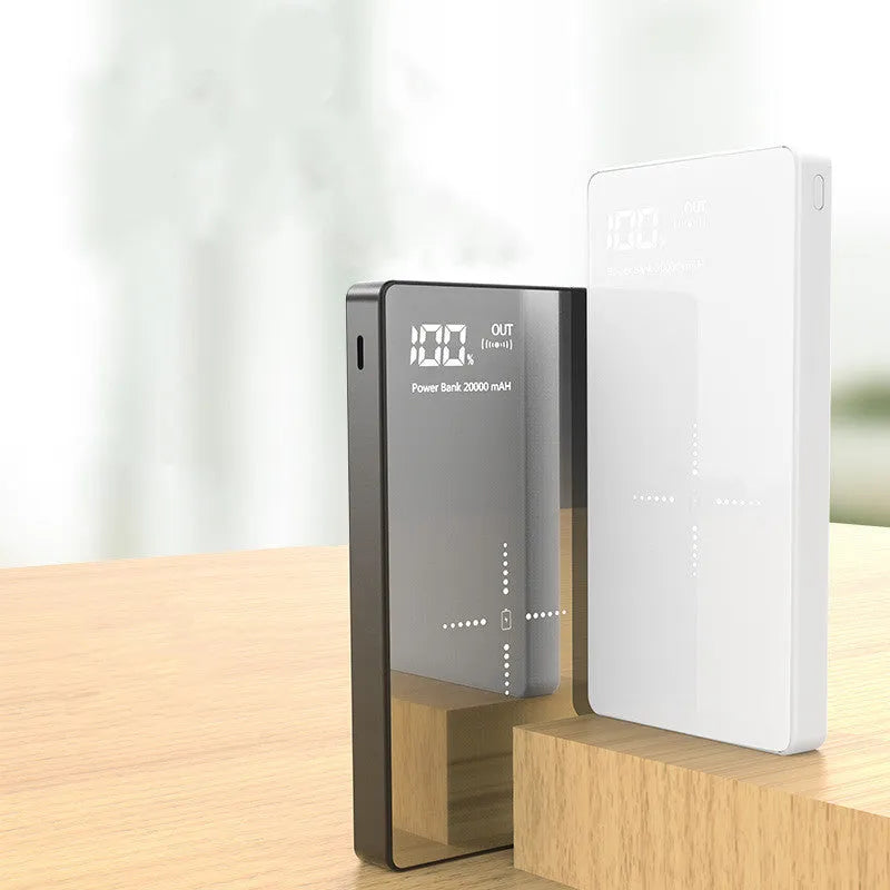 Black and white wireless charging power bank with digital display showing 20000 mAh capacity