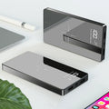 Black and white wireless charging power bank with digital display showing 20000 mAh capacity