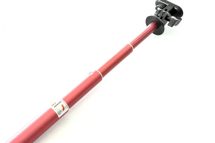 Aluminum alloy telescopic selfie stick with phone holder in black, gold, and pink colour options.