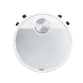 Golden robotic vacuum cleaner with remote control on wooden floor