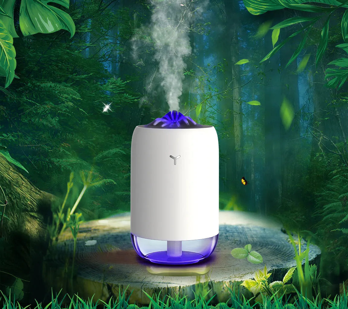 Magic Flame white mini ultrasonic humidifier with USB cable on desktop, columnar shape